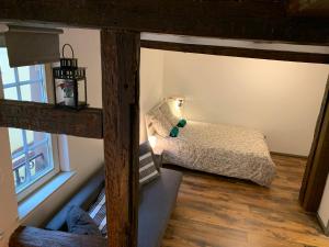 Ένα ή περισσότερα κρεβάτια σε δωμάτιο στο Historical town center cosy flat