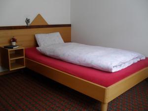 Letto o letti in una camera di Hotel Restaurant Aletsch