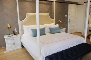Postel nebo postele na pokoji v ubytování Hotel Conde de Penalba