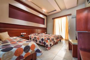 Postel nebo postele na pokoji v ubytování Canadian Hotel