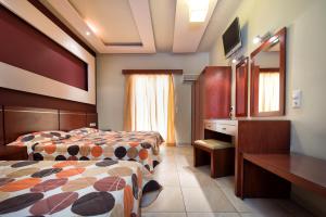 Postel nebo postele na pokoji v ubytování Canadian Hotel