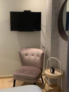 TV a/nebo společenská místnost v ubytování Hotel Conde de Penalba