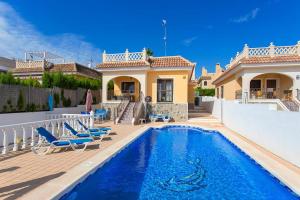 The swimming pool at or close to CH Villa Isla Espalmador Ciudad Quesada