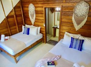 Postel nebo postele na pokoji v ubytování Coconut by ÓOL Hotels