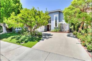 an empty driveway in front of a house at Stunning home near lake in Mission Viejo