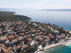 an aerial view of a town on the water at Apartments Jasminka in Selce