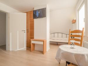 TV a/nebo společenská místnost v ubytování Ferienhaus Gretel in Zorge