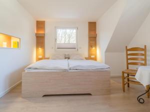 Postel nebo postele na pokoji v ubytování Ferienhaus Gretel in Zorge