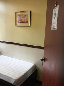 Rúm í herbergi á Hang Ho Hostel