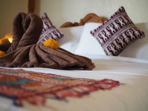 Kampung Sari Homestay客房内的一张或多张床位