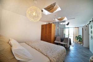 Posteľ alebo postele v izbe v ubytovaní B&B La Mimosa