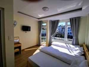 Postel nebo postele na pokoji v ubytování Sơn Liễu Homestay