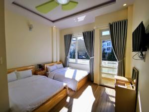TV a/nebo společenská místnost v ubytování Sơn Liễu Homestay