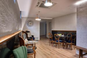 Posezení v ubytování La Via del Porto Charme Rooms