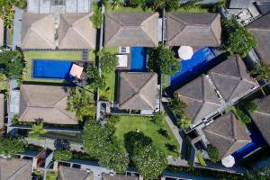 an overhead view of a house with a swimming pool at Villa Jerami in Seminyak