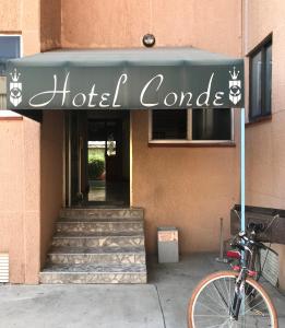 a bike parked in front of a hotel corner at Hotel Conde Alameda CDMX in Mexico City +23 photos