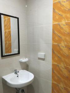 Koupelna v ubytování Downtown Suites
