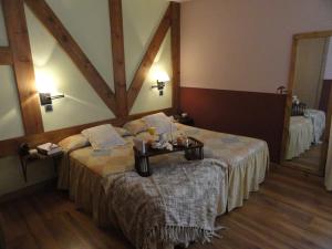 Cama o camas de una habitación en Hotel Rural El Valle