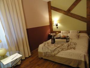 Cama o camas de una habitación en Hotel Rural El Valle