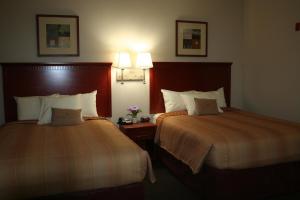 Candlewood Suites Avondale-New Orleans, an IHG Hotel tesisinde bir odada yatak veya yataklar