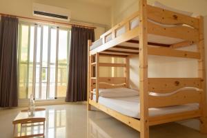 Ein Bett oder Betten in einem Zimmer der Unterkunft The Kite