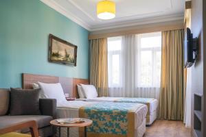 TV a/nebo společenská místnost v ubytování Side Village Family Suite - All Inclusive
