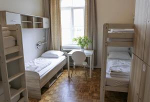 Letto o letti in una camera di C - Punkt Hostel