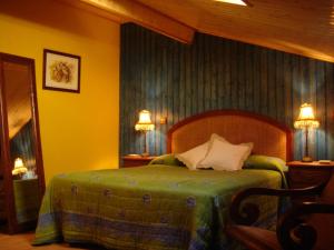 Cama o camas de una habitación en Hotel Rural El Valle