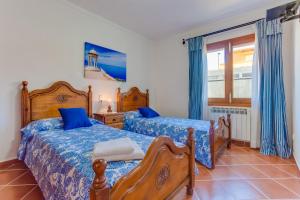 Posteľ alebo postele v izbe v ubytovaní Villa Ca S'Anglès + 20 fotografií