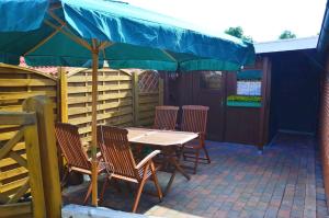 Fotografie z fotogalerie ubytování Ferienwohnung Petri Heil - nur für Urlaubsgäste - 85059 v destinaci Ostrhauderfehn