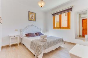 A bed or beds in a room at Cantino House Még 26 kép