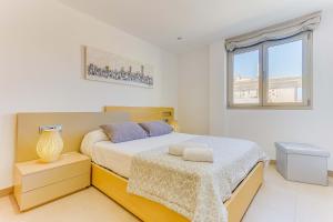 Postel nebo postele na pokoji v ubytování Apartment Ca Na Xisca I