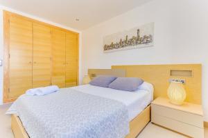 Postel nebo postele na pokoji v ubytování Apartment Ca Na Xisca I