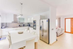 Kuchyň nebo kuchyňský kout v ubytování Apartment Ca Na Xisca I
