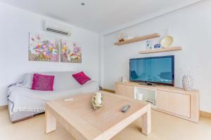 TV a/nebo společenská místnost v ubytování Apartment Ca Na Xisca I