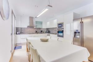 Kuchyň nebo kuchyňský kout v ubytování Apartment Ca Na Xisca I
