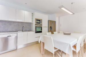 Kuchyň nebo kuchyňský kout v ubytování Apartment Ca Na Xisca I