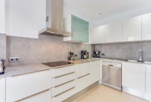 Kuchyň nebo kuchyňský kout v ubytování Apartment Ca Na Xisca I