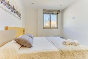 Postel nebo postele na pokoji v ubytování Apartment Ca Na Xisca I