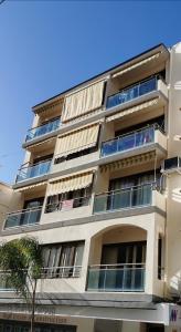 an apartment building with balconies on the side of it at Apartamentos Gladys in Moraira