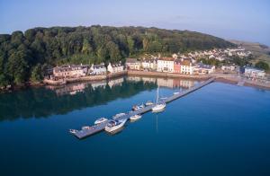 an aerial view of a harbor with boats in the water at FSC Dale Fort Hostel in Haverfordwest