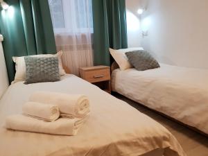 Postel nebo postele na pokoji v ubytování Hostel Mleczna - Metro Zacisze