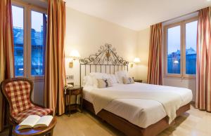 Rúm í herbergi á Hotel Andria