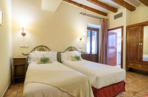 Rúm í herbergi á Hotel Andria
