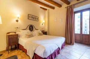 Rúm í herbergi á Hotel Andria