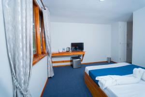 Ein Bett oder Betten in einem Zimmer der Unterkunft Havana Club Resort