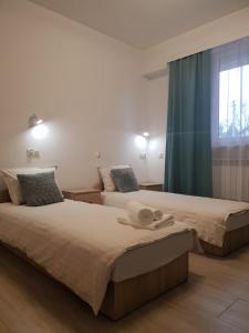 Postel nebo postele na pokoji v ubytování Hostel Mleczna - Metro Zacisze