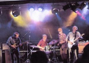 a group of people playing music on a stage at Danninghus in Vindeby