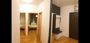 Postel nebo postele na pokoji v ubytování Apartman Zoe