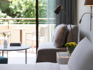 Area soggiorno di Amus Hotel & Spa